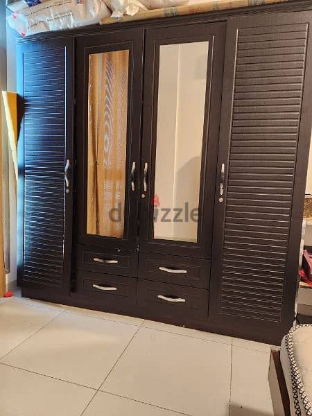 4 door wooden wardrobe for sale 0