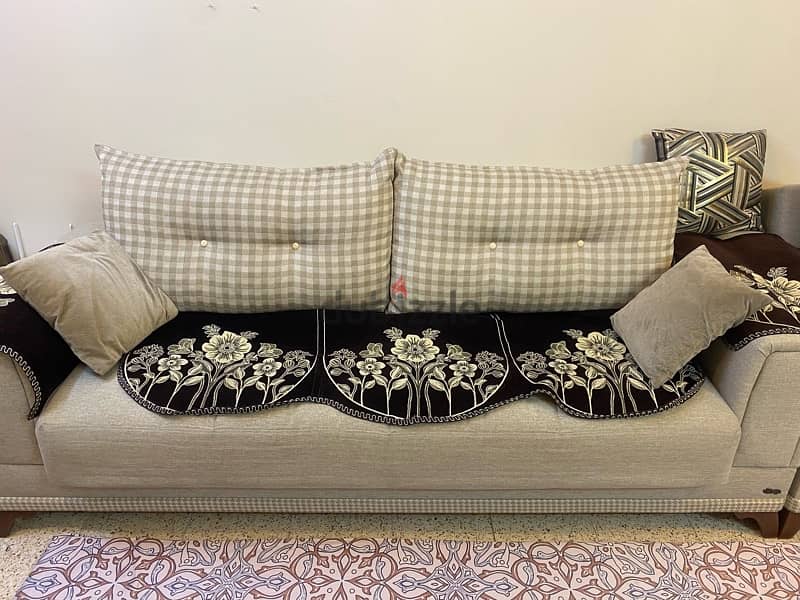 3 seater sofa cum bed and 1 seater sofa with storage 1