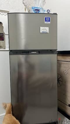 Hitachi top mount refrigerator including adjustable stand