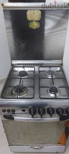 4 burner cooking range with grill and over working perfectly