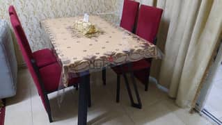 dining table including 4 chair