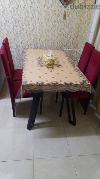 dining table including 4 chair 1