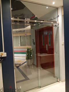 Sliding Tempar glass door. . 10mm glass