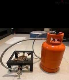 single  burner camp stove with regulator and  7kg cylinder ( empty)