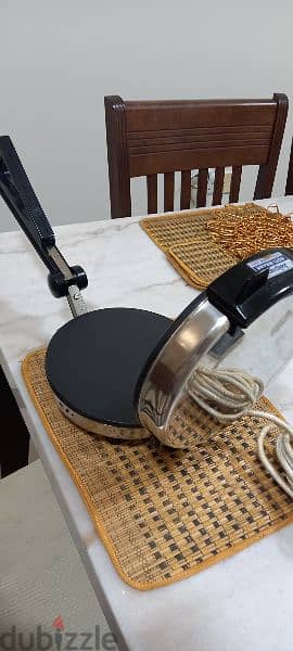 Roti maker heavy duty steel body with non stick plates 1