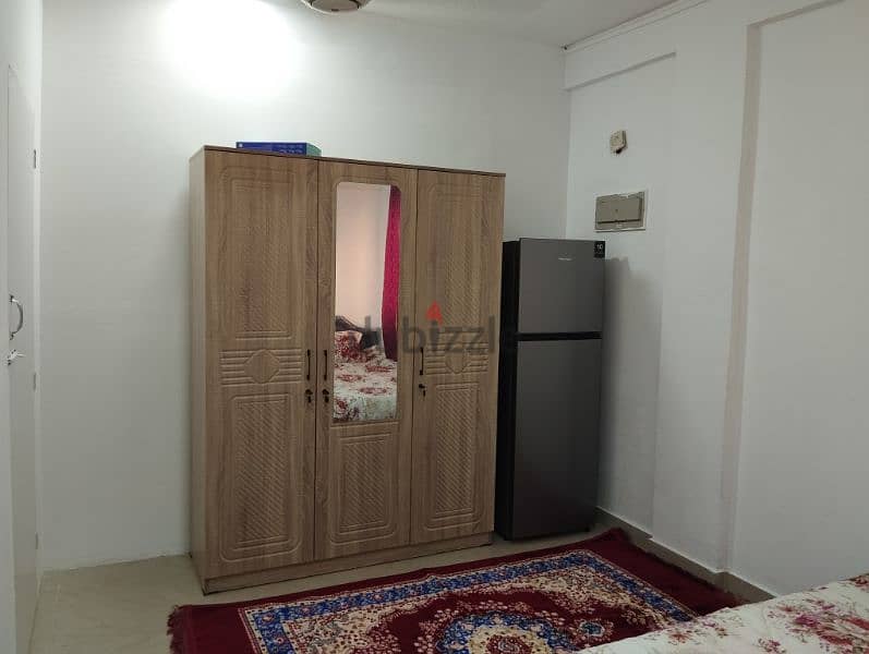 family room with neat and clean with kitchen and WiFi near Al ghubrah 1