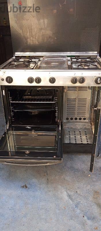 gas and electric induction oven neat and clean 4