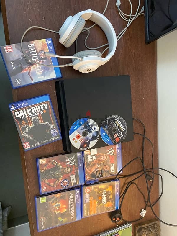 ps4 with a lot of games and a head mic but no controller 1