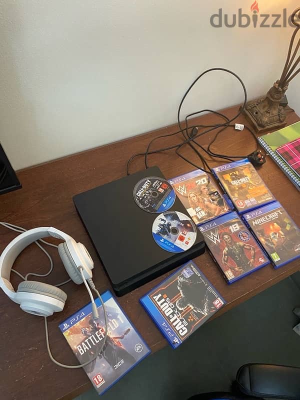 ps4 with a lot of games and a head mic but no controller 2