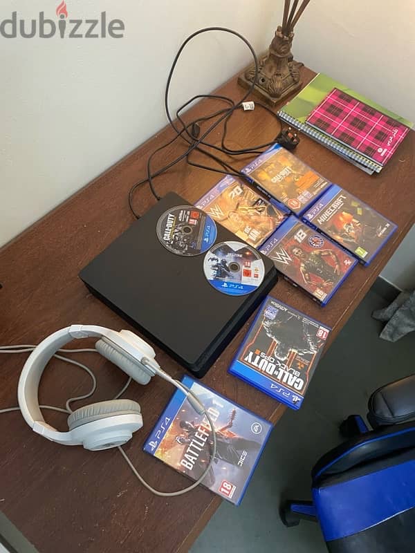 ps4 with a lot of cds and headset 2