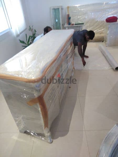 Muscat House shifting (Muscat Movers and Packers)Curtain tv installatn 2