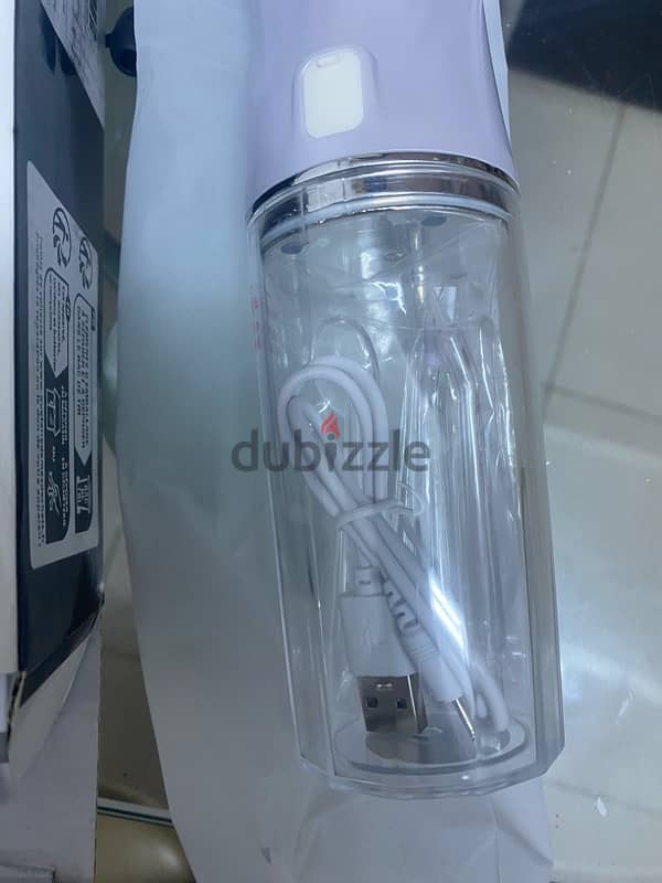 BRAND NEW UNUSED PORTABLE ORAL IRRIGATOR 2