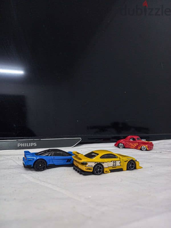 Hotwheels and none branded cars in good condition fair deal 7 rials! 2