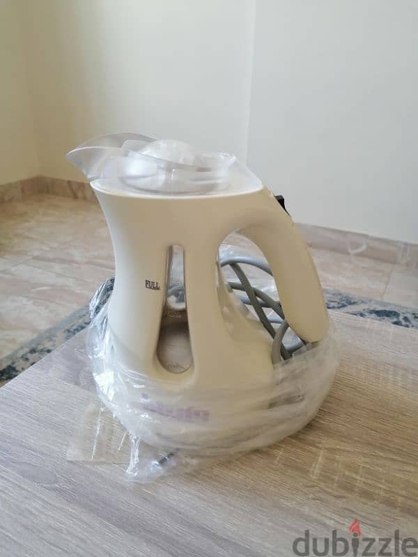 جهاز ٣في١)(3in 1 device (water boiler, steam iron, and egg boiler 1