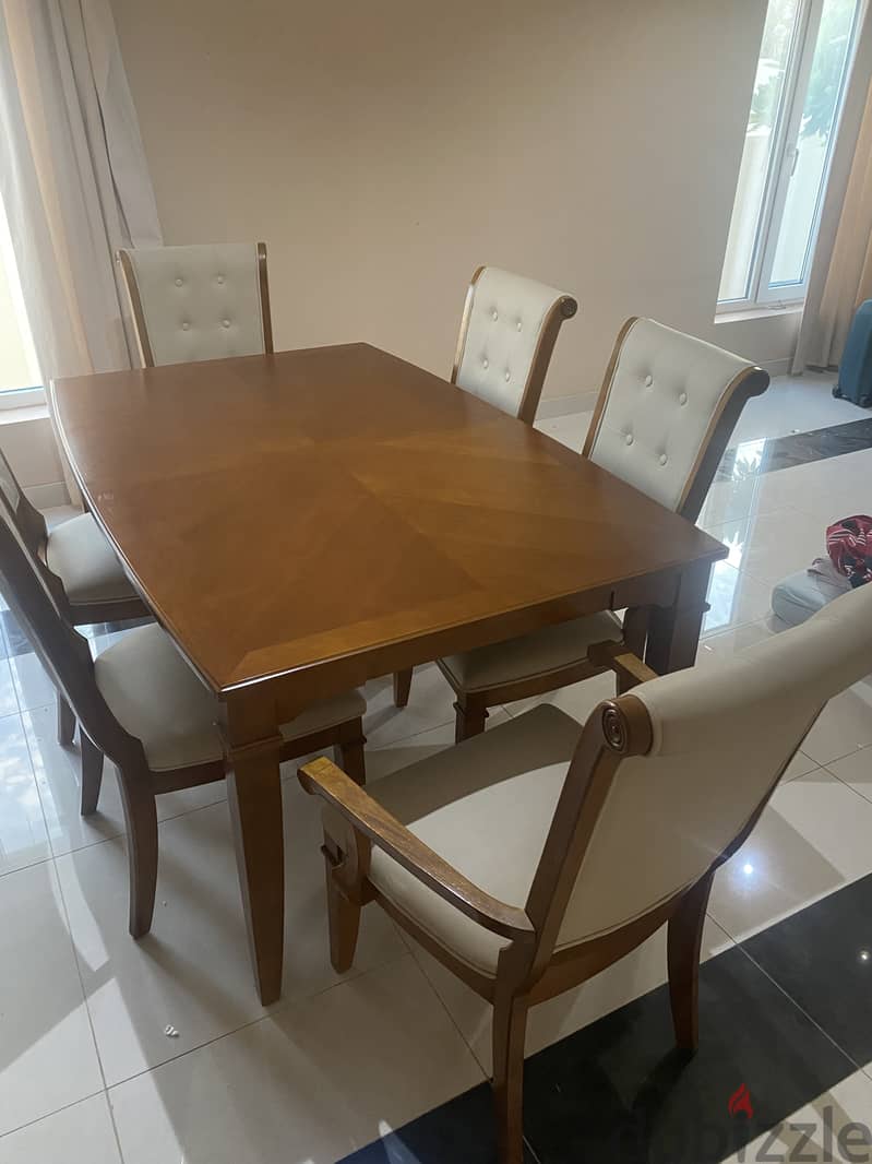 Dining set with expandable table and cupboard in very good condition 0