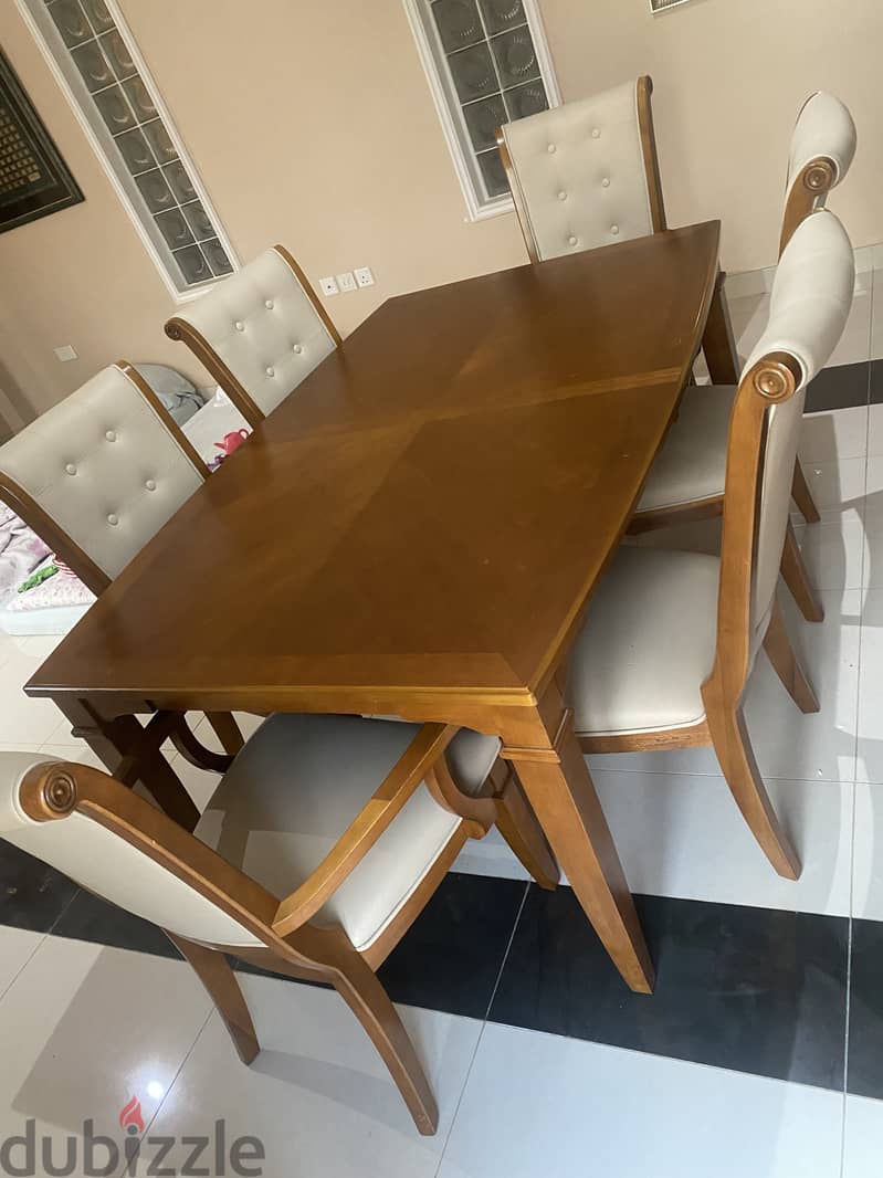 Dining set with expandable table and cupboard in very good condition 1