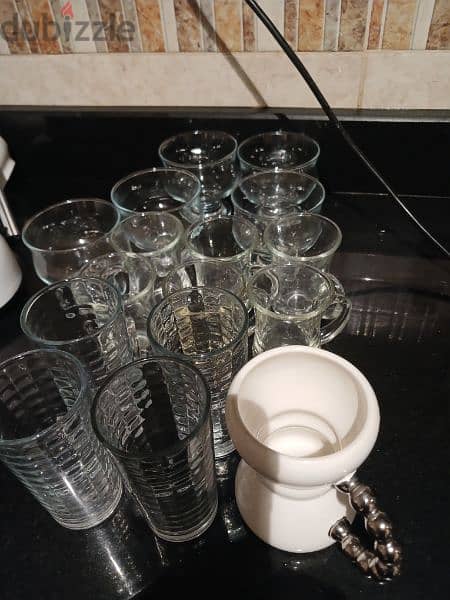 3 sets of cups abd new water warmer for sell 3