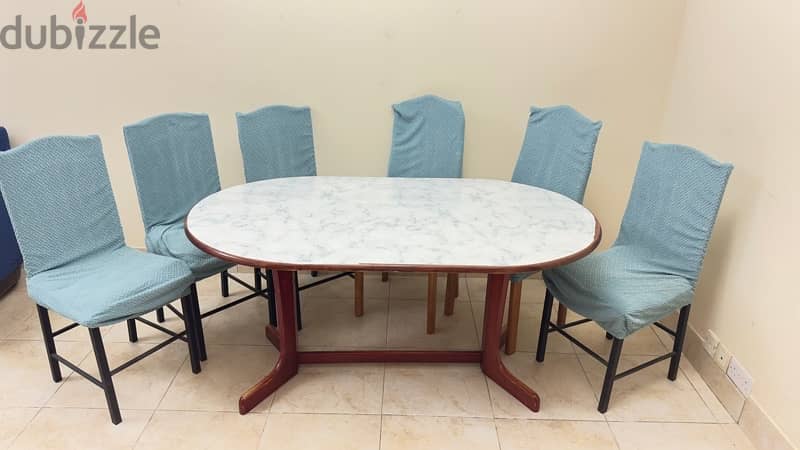 4 Seater dining table with 6 chairs 2