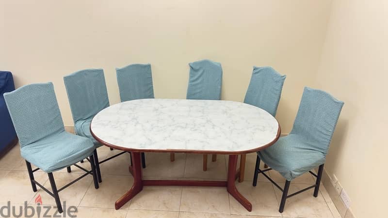 4 Seater dining table with 6 chairs 4