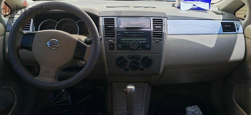 Nissan Tiida 2013 4