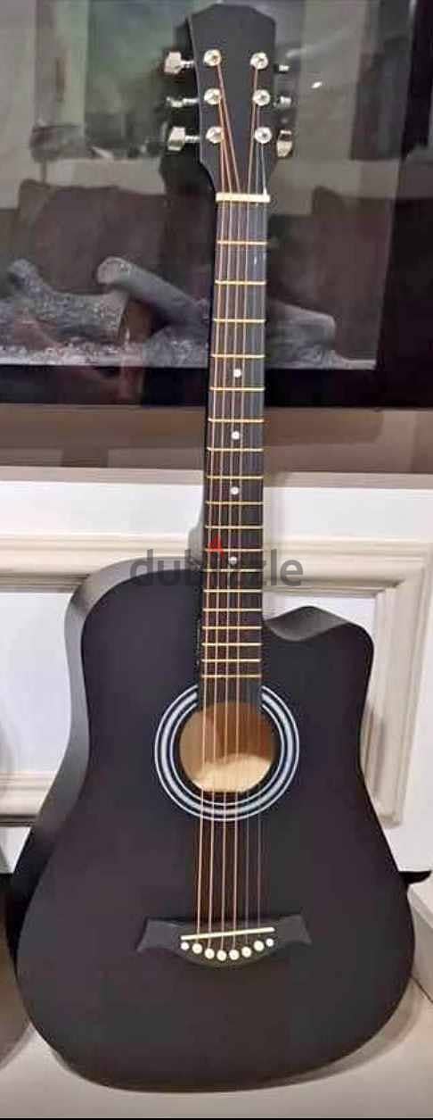 Guitar new free delivery all over oman 0