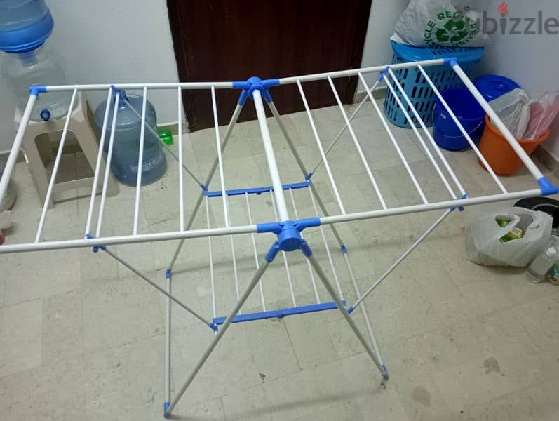 3 months old Cloth dryer stand 3 riyal only 1