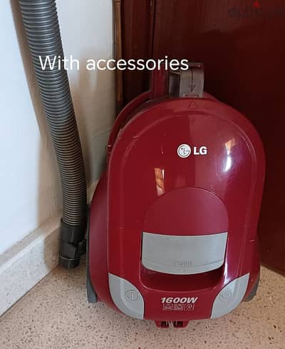 LG vacuum cleaner with all accessories.