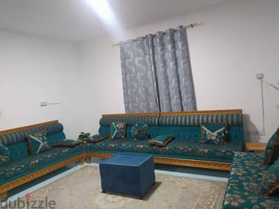 urgent sale of 12 seater sofa with table