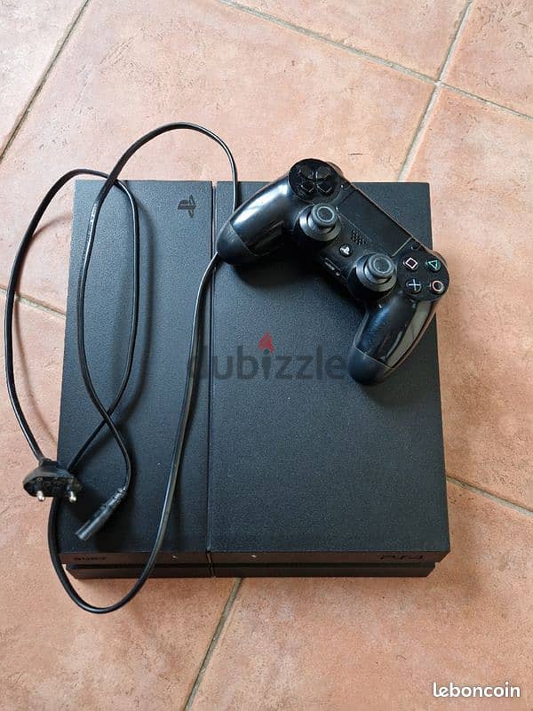 Sony playstation 4 phat 1tb with games and controller 0