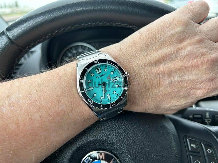 Citizen Eco-Drive Sports Turquoise Dial 0