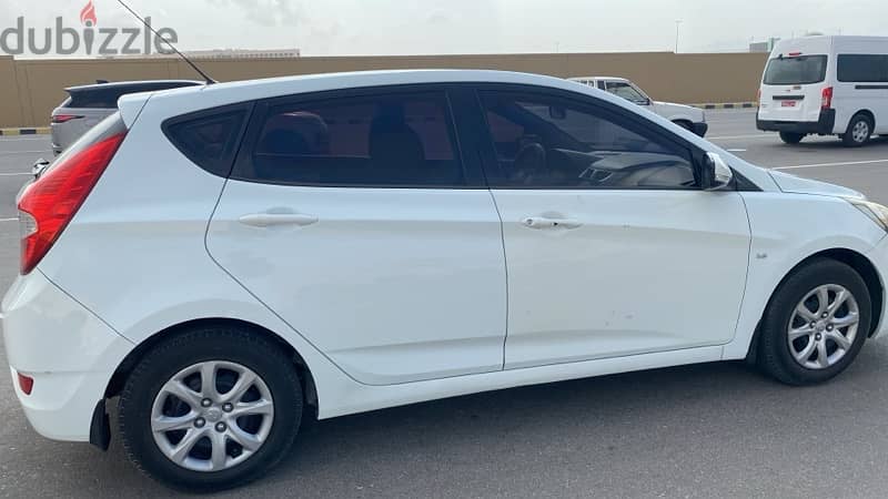 2013 Hyundai Accent Hatchback  'mailage 199 k ' Excellent condition 7