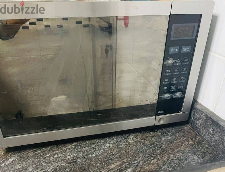 Good conditioned microwave oven with Grill for sale 1