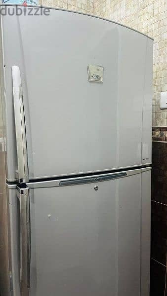 well condition one fridge and one washing machine for sale