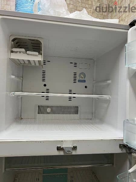 well condition one fridge and one washing machine for sale 3