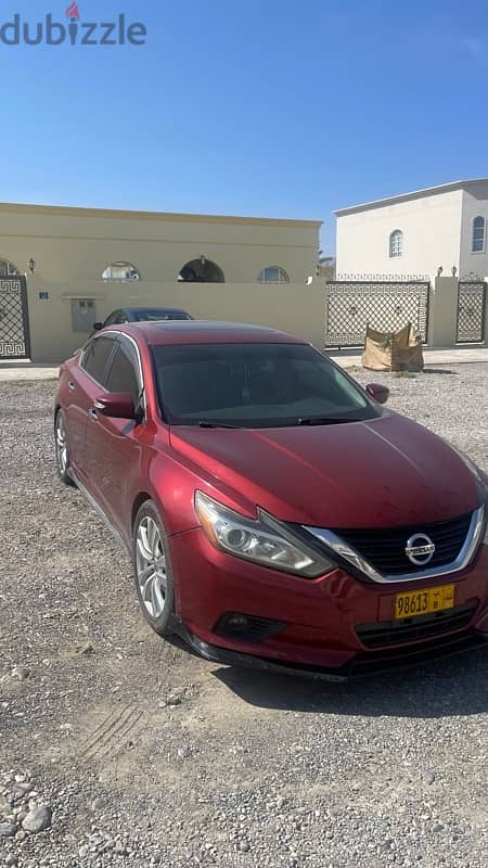 نيسان التيما 2016 nissan altima عنابي فيها تأمين طرف ثالث والامارات 0