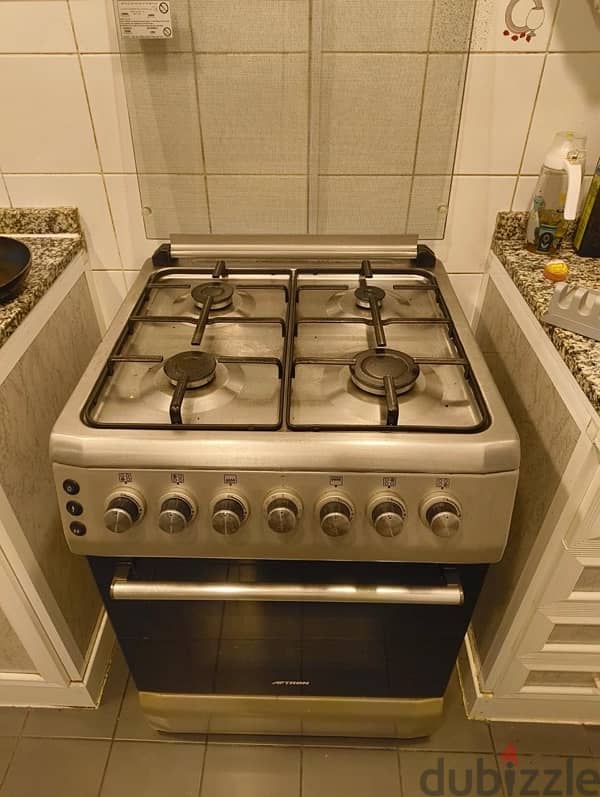 4-Burner Cooking Range with Oven 1