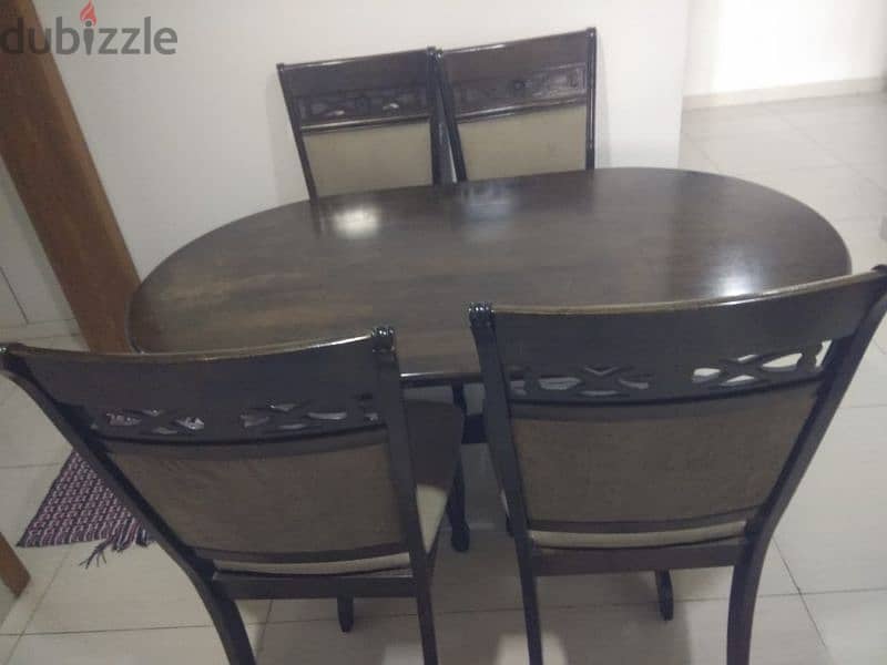 wooden dinning table + 6 chairs 0