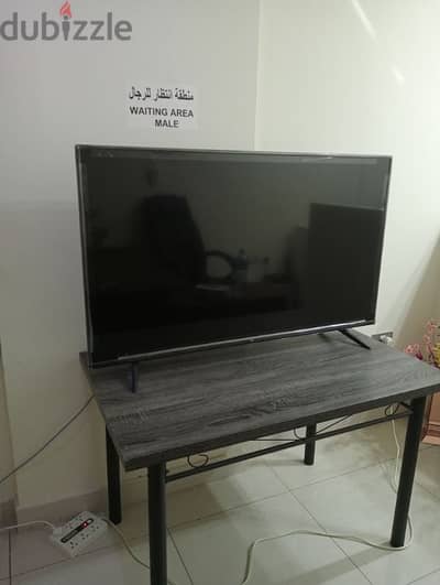 TCL TV 55 inch with Table