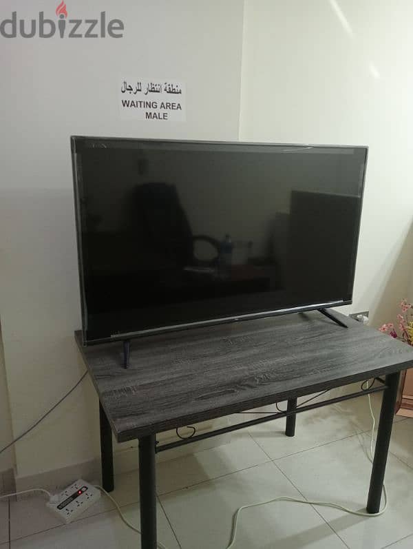 TCL TV 55 inch with Table 0