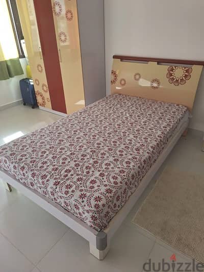 large single bed with mattress.