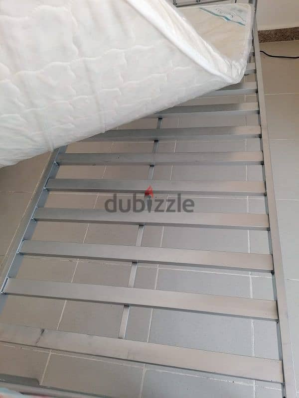 Like New Single Metal Bed With New Medicated Mattress For Sale 13 OMR 2