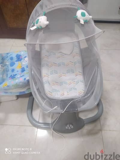 automatic swing and manual cot