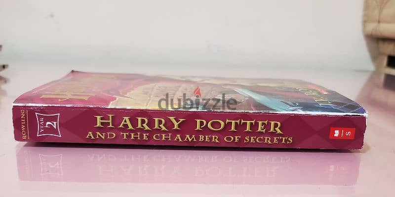 Harry Potter books 1-4 and the cursed child 3