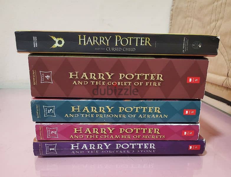 Harry Potter books 1-4 and the cursed child 9