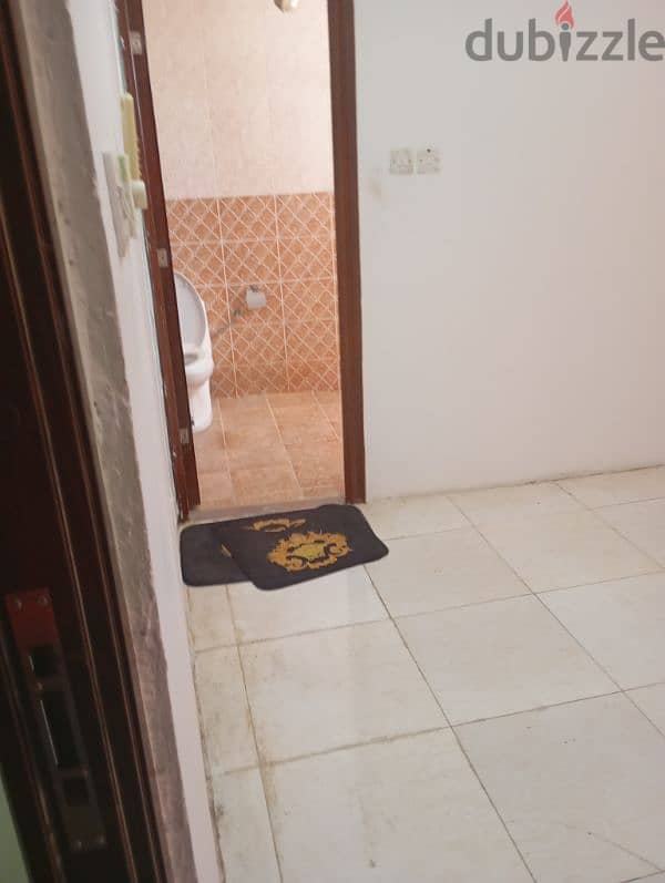 Amerat Al Nahda room and bathroom 3