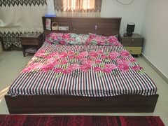 kingsize bed with mattress and side table and dressing table 0