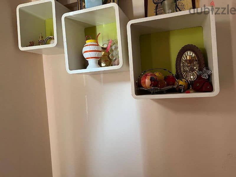 double bed, wall mounted book shelf and side table 1