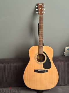 Yamaha Acoustic Guitar F310 with free strings 3 packs and peaks 0