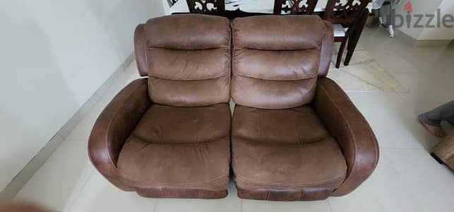 recliner two seater sofa. Good condition.