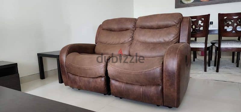 recliner two seater sofa. Good condition. 1